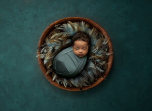 Austin Newborn Photographer baby boy wrapped in blue